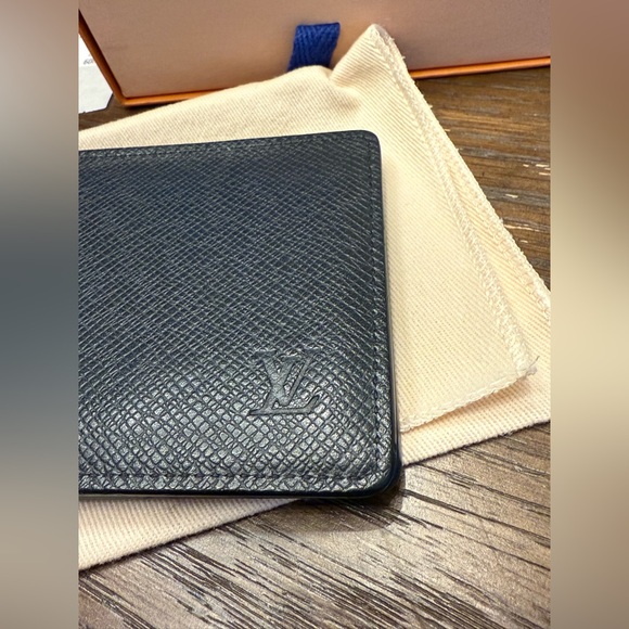Authentic Louis Vuitton multiple wallet in Taiga Noir w/ receipt, jacket, & box - Picture 2 of 11
